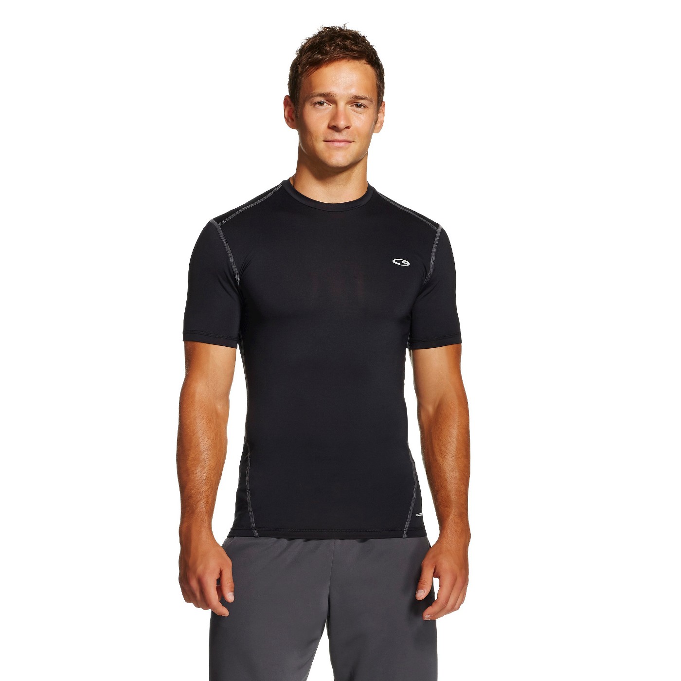 Man models black compression shirt.