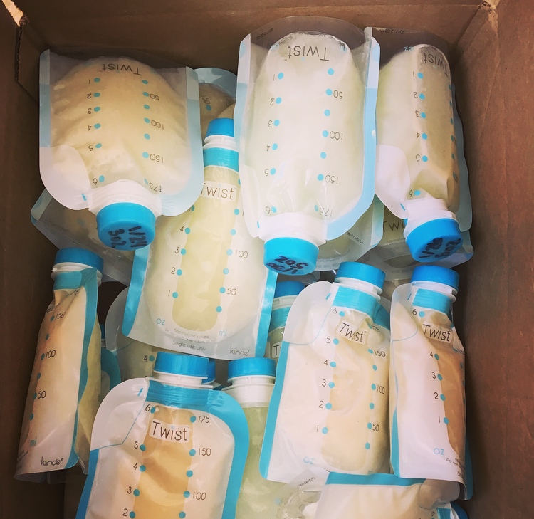 Several packages of pumped breastmilk.