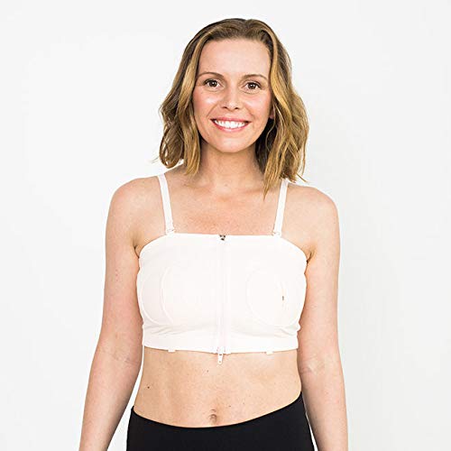 Woman models hands free pumping bra.